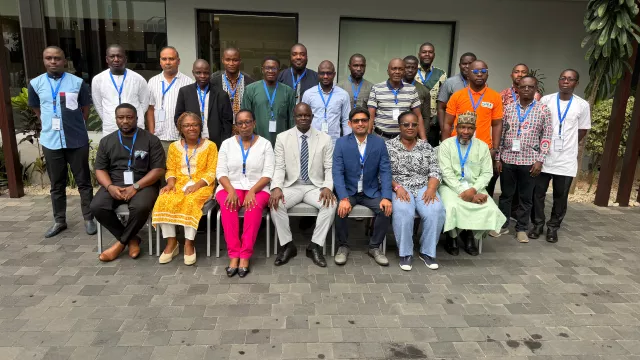 Participants and facilitators of the Regional Capacity Strengthening Workshop on High-Throughput Phenotyping and Genotyping Shared Services gather for the official group photo at Silver Moon Hotel, Abidjan, Côte d'Ivoire.
